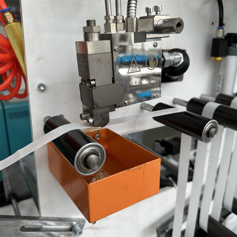 Apply removable glue on release paper Apply removable glue on release paper